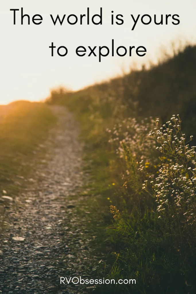 Travel Quotes Inspiration - The world is yours to explore. The background is a country path