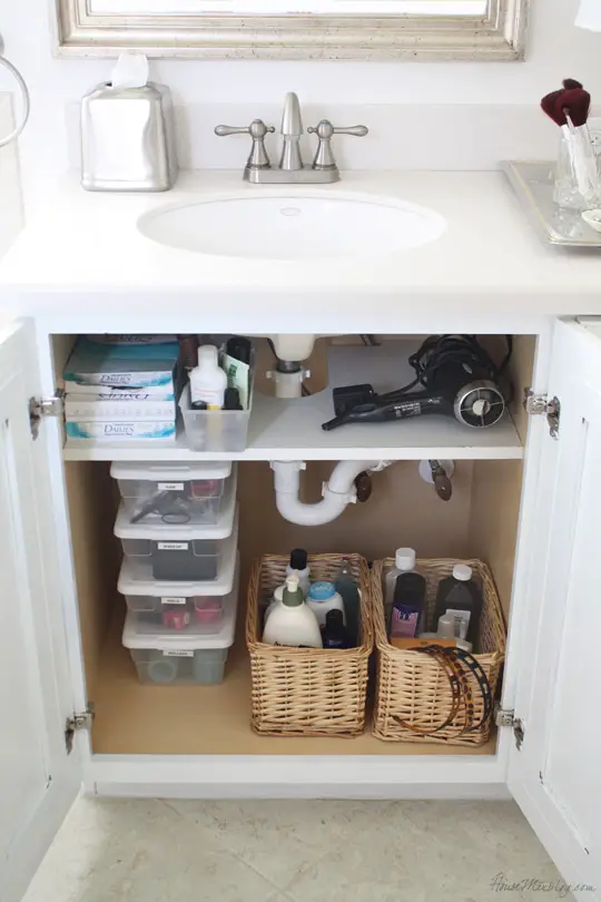 custom shelves around drain pipes to turn that awkward space into something useful.