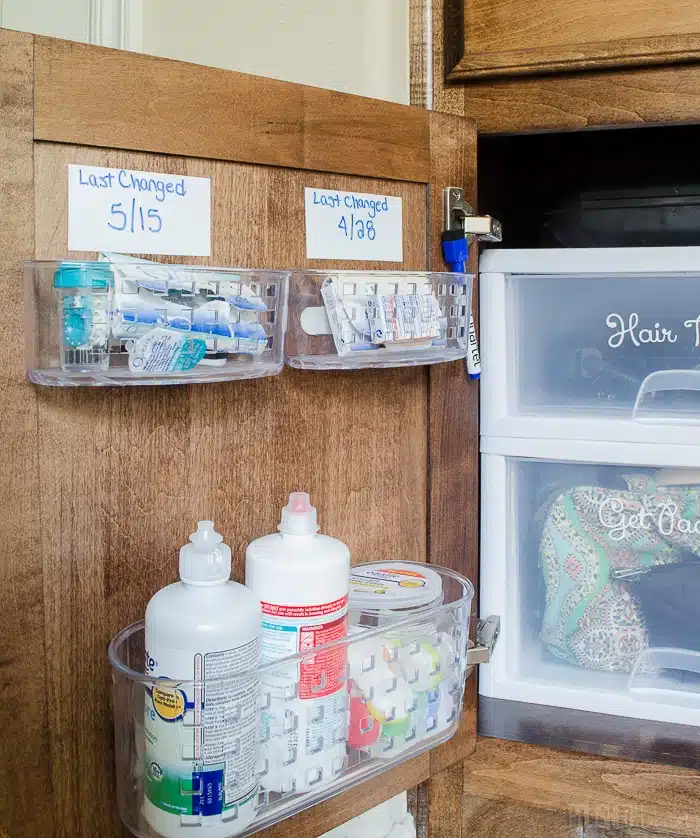 Small Bathroom Storage Ideas - Using the space on the door means that you can have your most used items handy to use all the time.