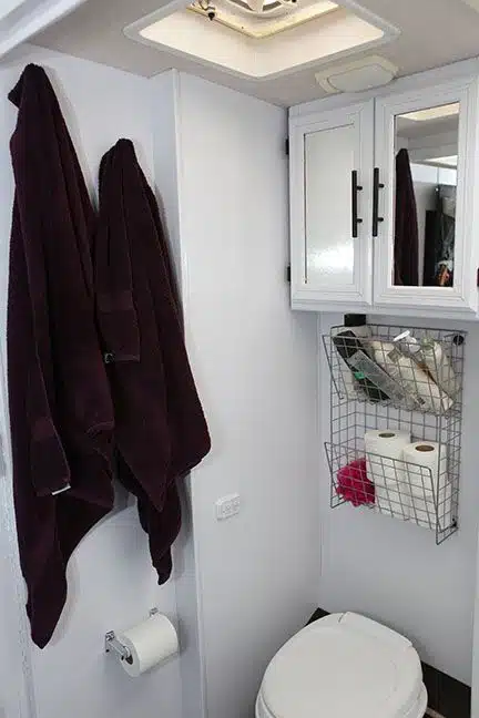 Small Bathroom Storage Ideas - Shelves or baskets above the toilet are the perfect place for storage.