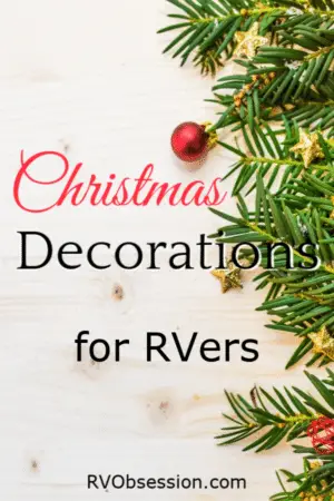 Christmas decorations on a wooden background. Caption: Christmas Decorations for RVers