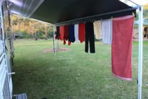 laundry drying from a line under the RV awning