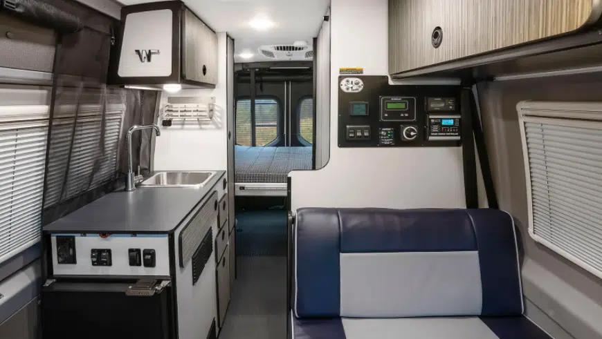 Interior of the small Winnebago Revel camper van, looking towards the rear doors