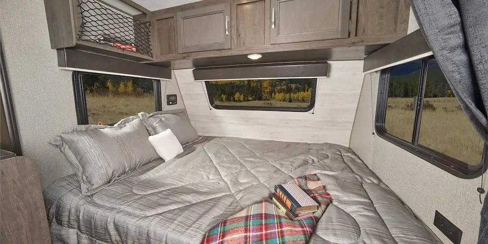 Bed area in the Jay Flight SLX7 lite weight travel trailer.