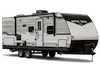 White, beige and black travel trailer.