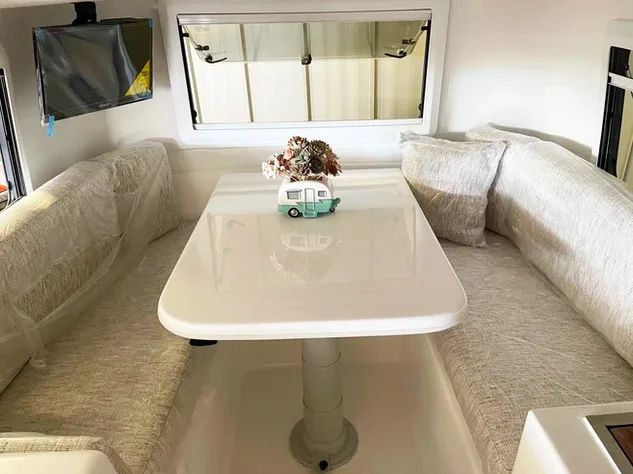 Interior view of a cortes 17 travel trailer showing the dining area.