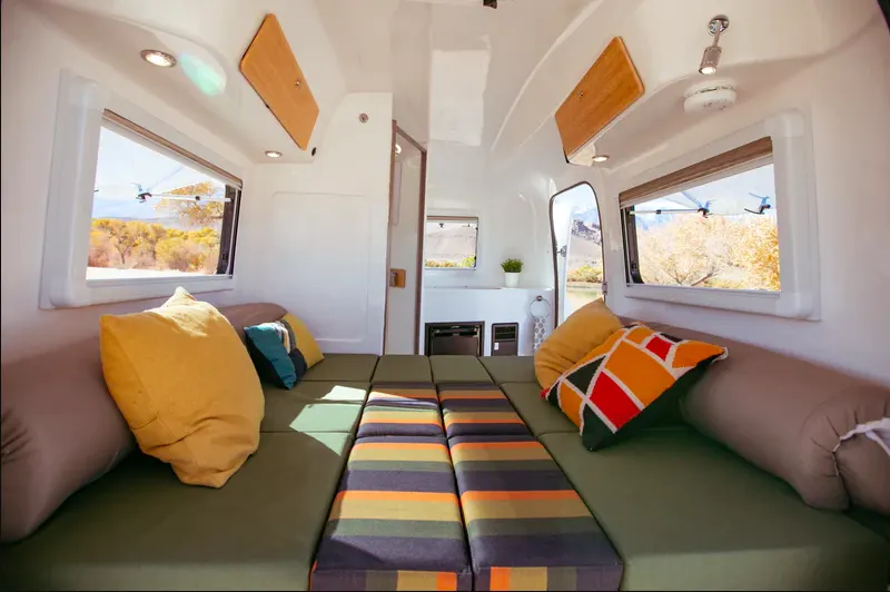 Interior view of the Happier Camper HC1 Studio fiberglass travel trailer.