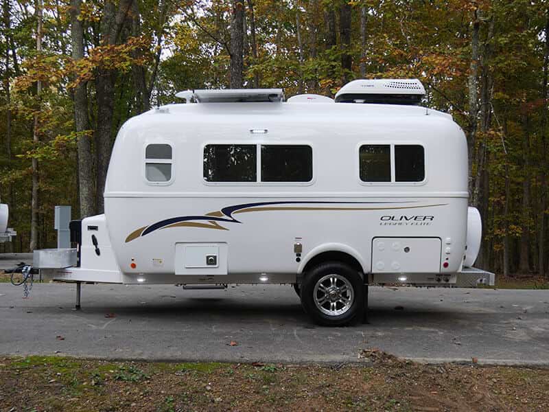 White Oliver Travel Trailer parked on a driveway