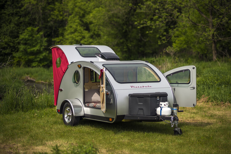 Exterior view of the Vistabule Teardrop Camper in a outdoor setting.