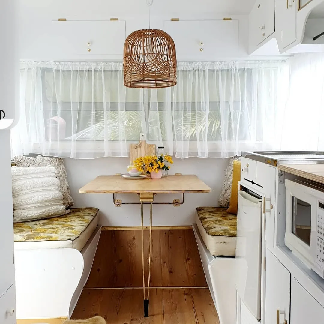Dining area inside a newly decorated vintage camper.