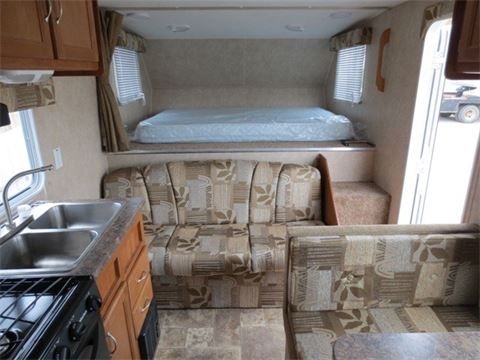 Interior of the bed end in the Allen Camper fifth wheel