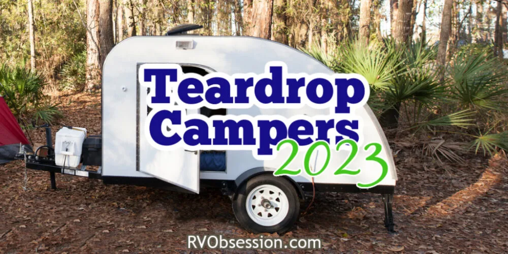 Small teardrop camper with door open and text overlay that reads: Teardrop campers 2023.