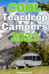 Teardrop camper parked in front of mountain with text overlay that reads: Cool Teardrop Campers 2023.