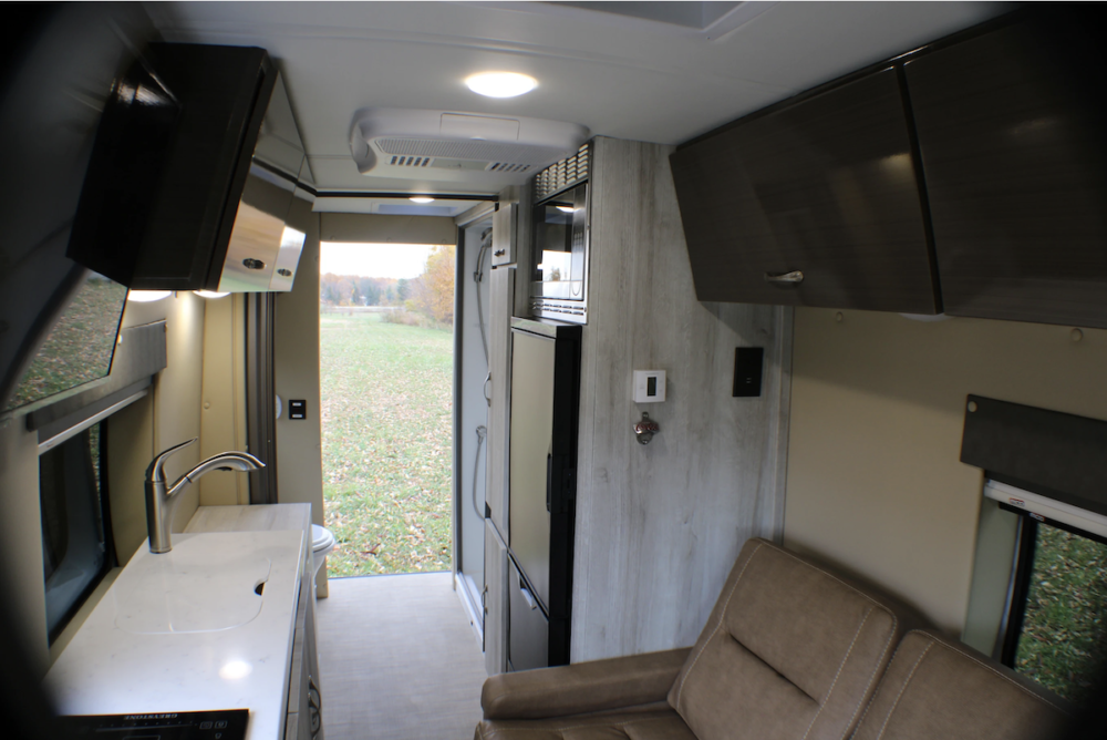 Interior of the Chinook RV Bayside Class B RV looking towards the rear of the van.