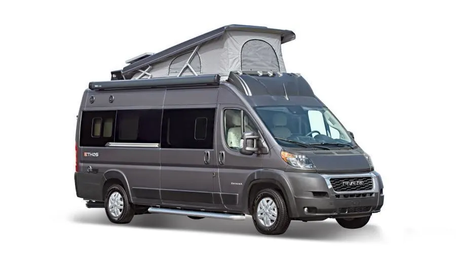 Exterior view of a dark grey Entegra Coach Ethos Class B RV with the pop top roof extended.