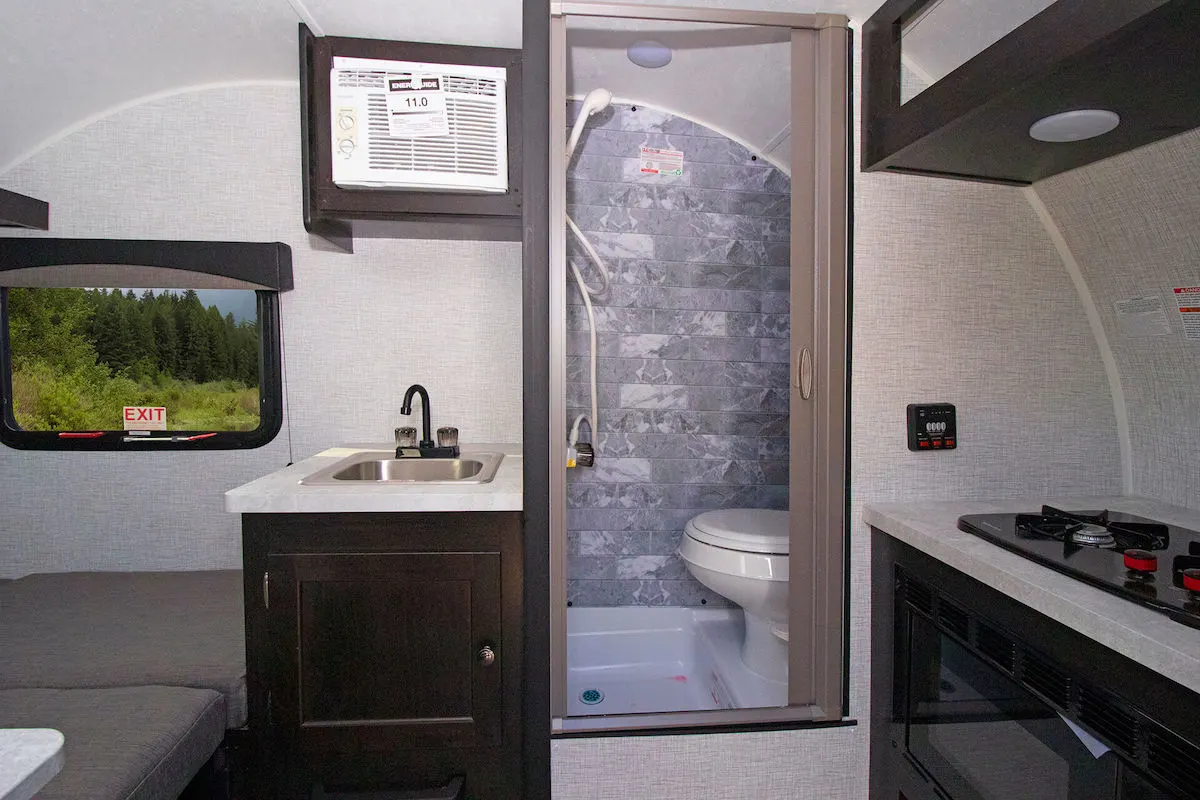 Inside the Braxton Creek Bushwhacker Plus travel trailer showing the bathroom area.
