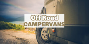 Close up shot of the front tire of a van on a dirt road, with text overlay that reads: Offroad campervans.