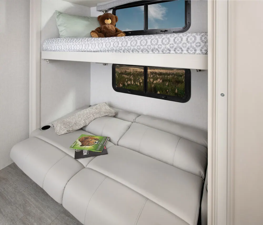 Interior of a Fleetwood RV Flair 33B6 Class A motorhome showing the bunk area.