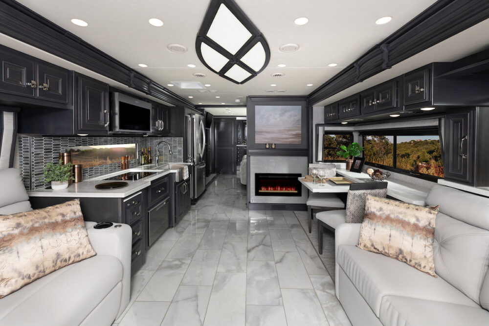 An interior view of a Holiday Rambler Armada 44B Class A motorhome showing a luxurious and spacious interior.