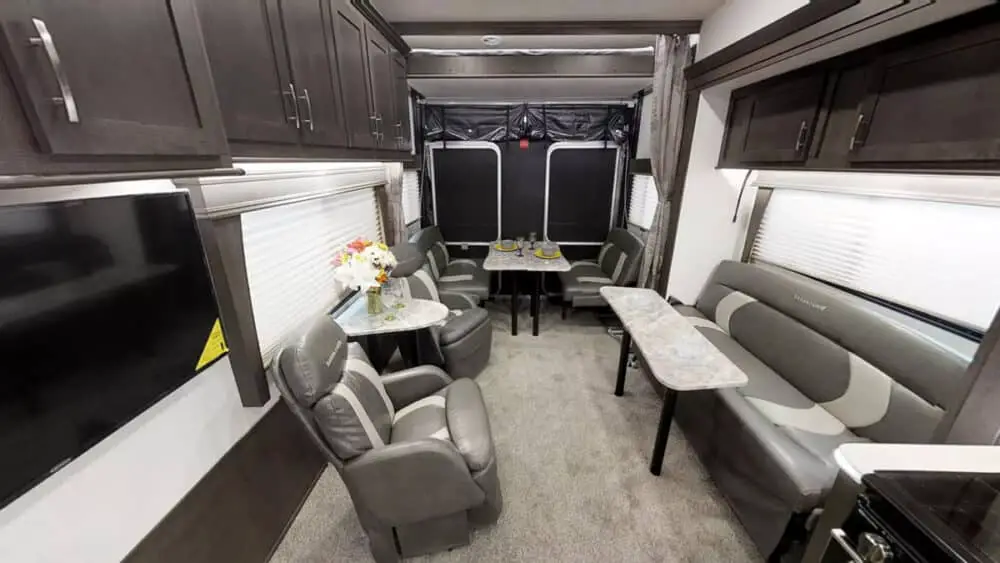 Interior of Forest River Sandstorm 286GSLR showing spacious living room that converts to garage.